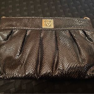 Anne Klein Black Textured clutch with strap